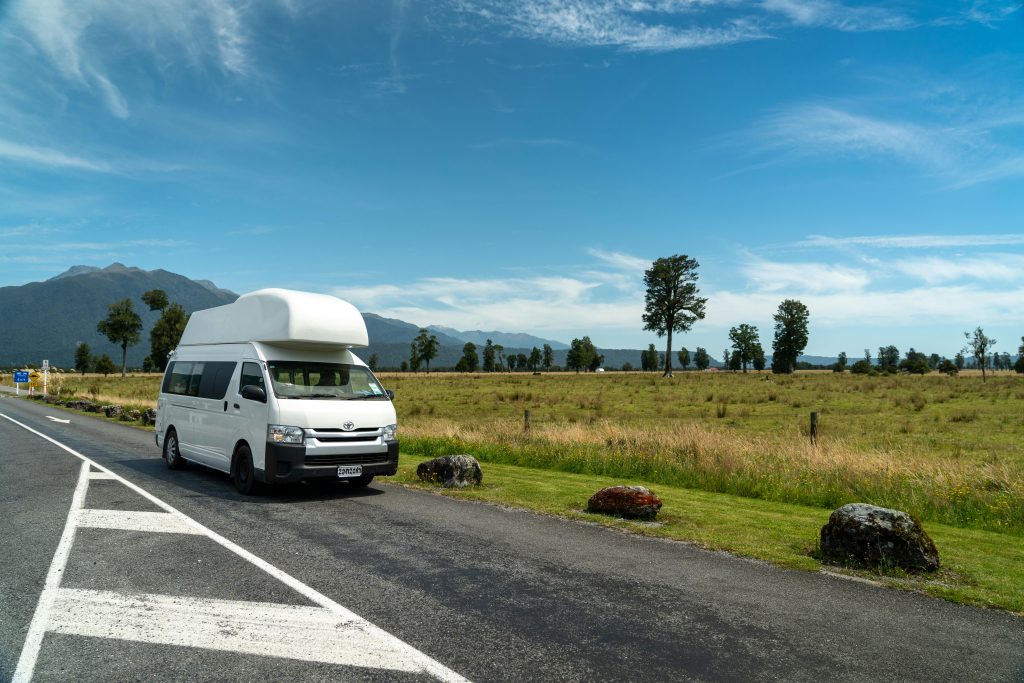 Campervan at the side of the road in New Zealand, car loan benefits.